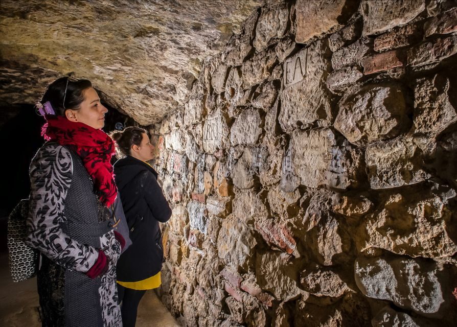Budapest: Buda Castle Cave Tour - Entering the Caves: Trinity Square vs. Dárda Street (and Why Shorter Options Matter)