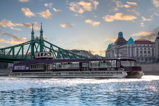 Budapest Danube 1 Hour Sunset or Night Cruise with Audio Guide - Liberty Bridge and Hotel Gellért: A Thermal-Bath Hint from the Water
