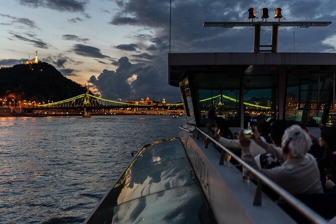 Budapest Danube River Sightseeing Night Cruise with Drink - Margaret Island Views: A Calm Break Between Big Landmarks