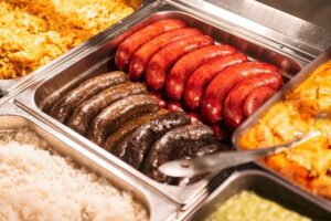Budapest Tipsy Food Tour with Wines, Small Group & Local Guide - Belvárosi Disznótoros: sausage tasting with a famous connection