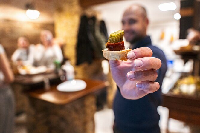 Budapest Tipsy Food Tour with Wines, Small Group & Local Guide - Váci Street street food: langos and chimney cake in motion