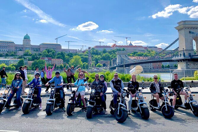 Monster Bike Sightseeing Tour – City Budapest on Electric Rollers - Across the Chain Bridge and into the riverbank memorial
