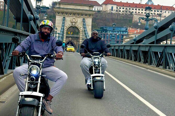 Monster Bike Sightseeing Tour – City Budapest on Electric Rollers - Hungarian Parliament Building: quick look, big landmark energy